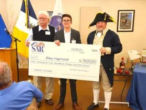 Photo 5 BBP Chapter CG, Nov 16-2024 at BBP Liberty Awards Dinner, Reno. L-R BBP Treas. Jim McLane, Contestant Riley Haymond, BBP Pres. Donn Dalton. by Rich. Schori